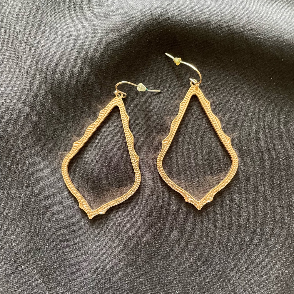 Kendra Scott earrings.